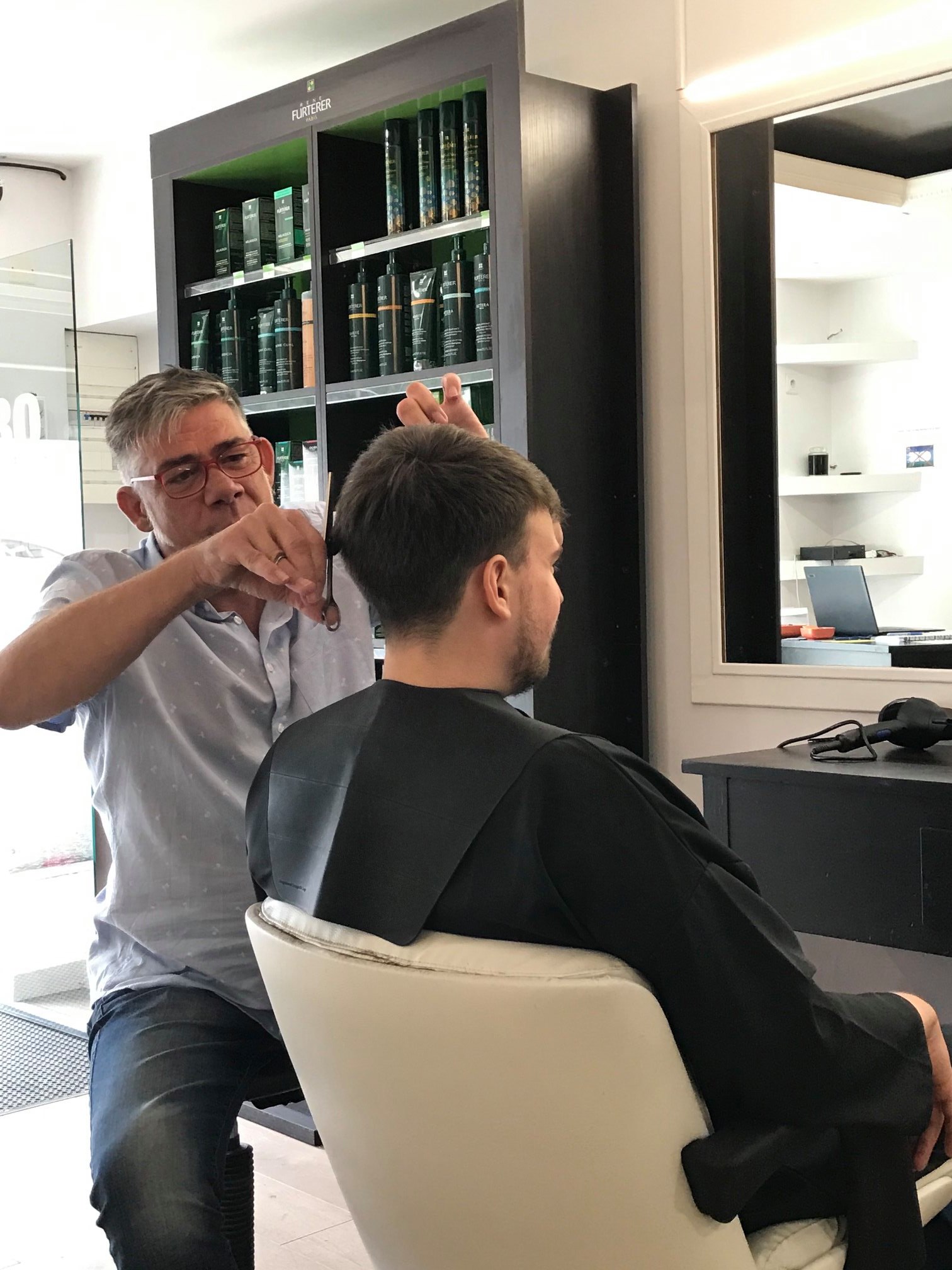 adult man getting haircut